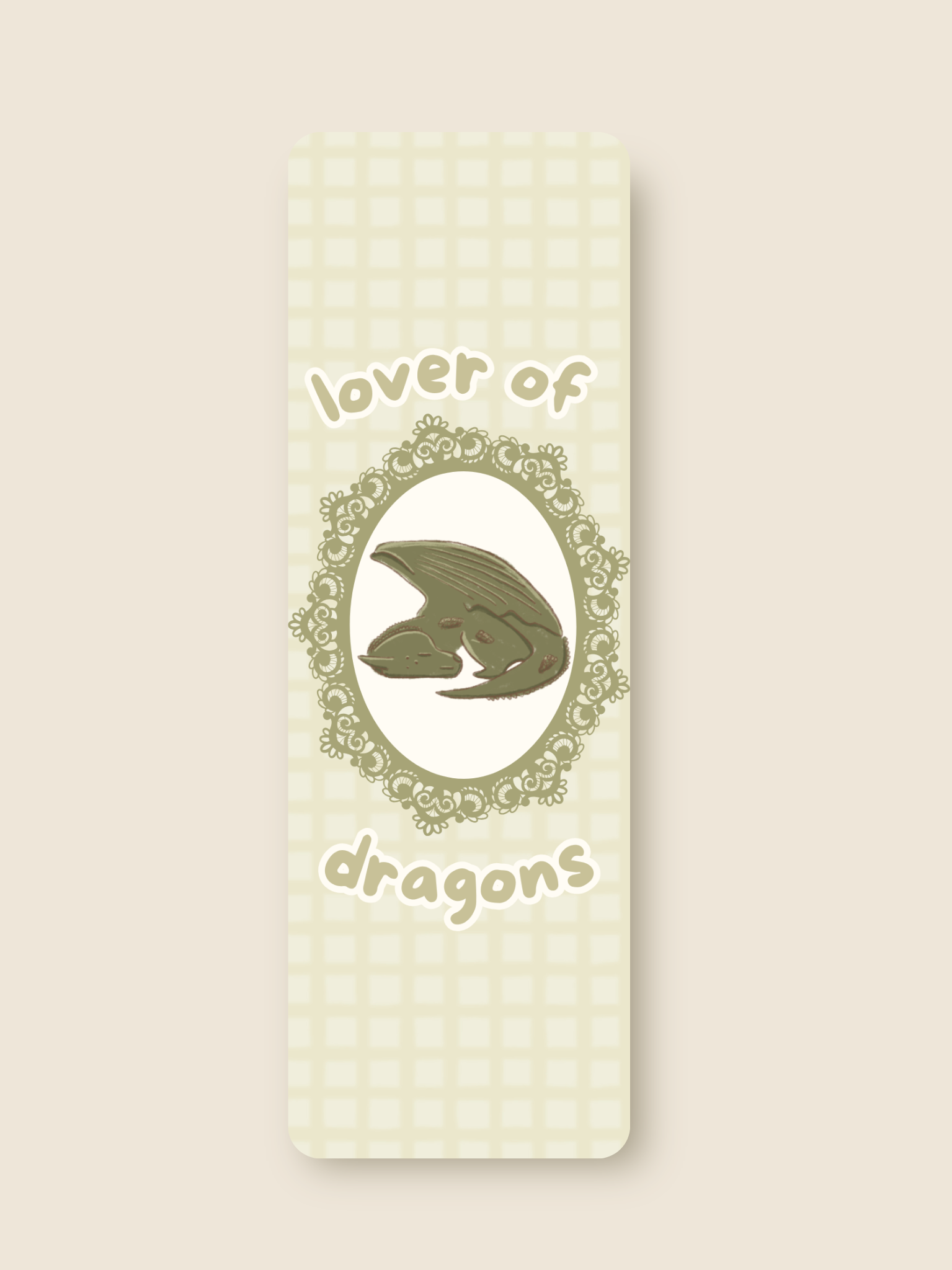 this is a green bookmark of a dragon napping
